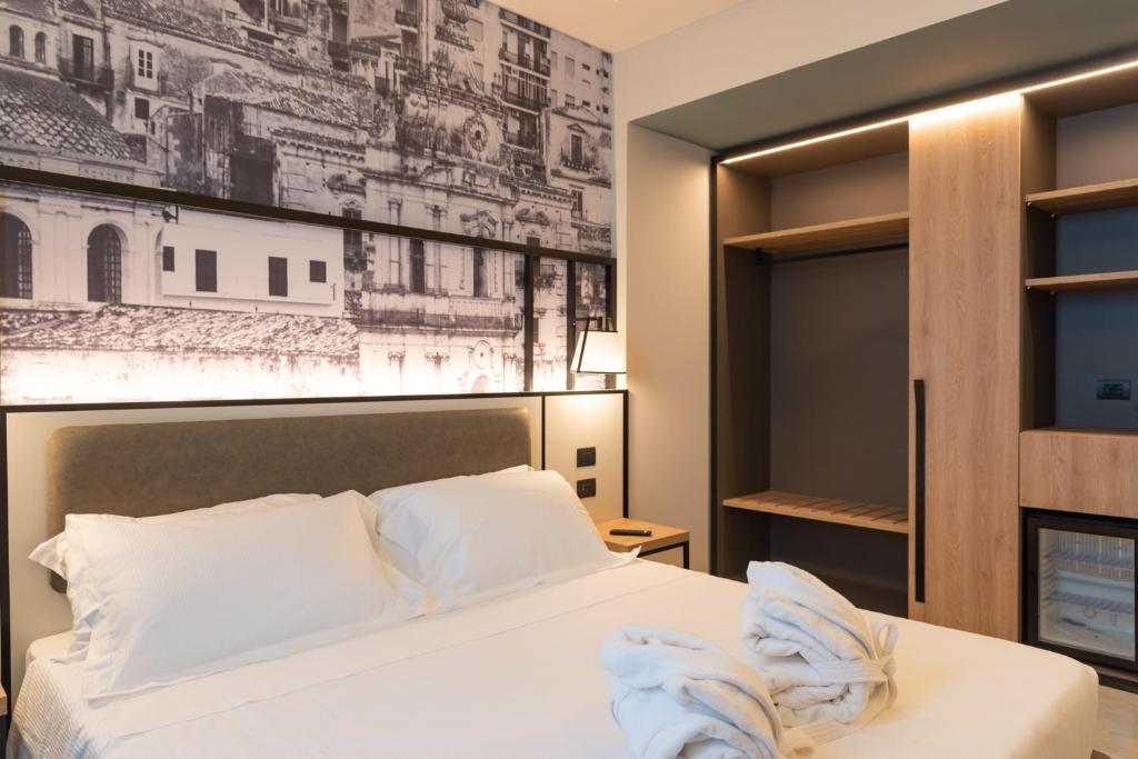 modica-boutique-hotel-private-pool-hotels-italy-3 Modica Boutique Hotel room 2